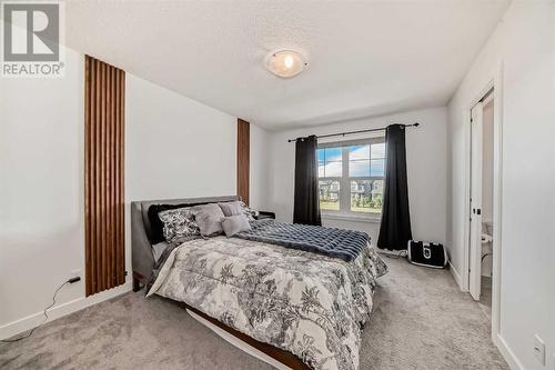 114 Midgrove Greenway Sw, Airdrie, AB - Indoor Photo Showing Bedroom