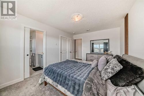 114 Midgrove Greenway Sw, Airdrie, AB - Indoor Photo Showing Bedroom