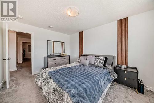 114 Midgrove Greenway Sw, Airdrie, AB - Indoor Photo Showing Bedroom