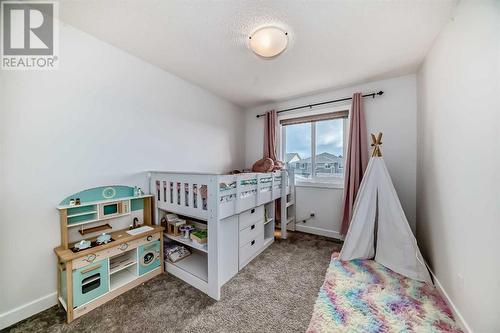 114 Midgrove Greenway Sw, Airdrie, AB - Indoor Photo Showing Bedroom