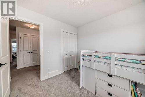 114 Midgrove Greenway Sw, Airdrie, AB - Indoor Photo Showing Bedroom