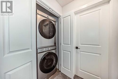 114 Midgrove Greenway Sw, Airdrie, AB - Indoor Photo Showing Laundry Room