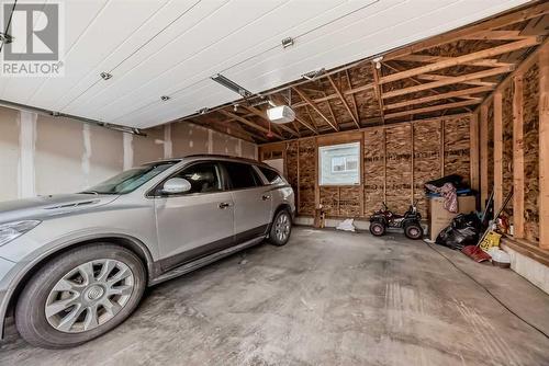 114 Midgrove Greenway Sw, Airdrie, AB - Indoor Photo Showing Garage