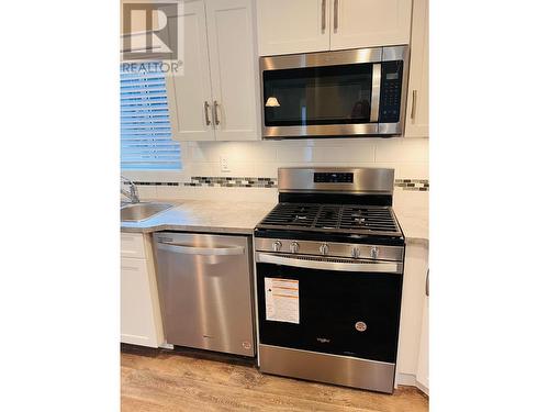 1500 Neimi Road Unit# 37, Christina Lake, BC - Indoor Photo Showing Kitchen With Double Sink