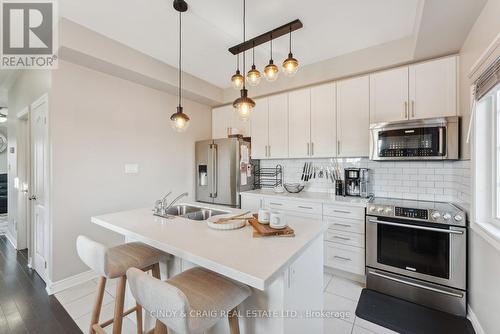 102 Ferris Square, Clarington, ON - Indoor Photo Showing Kitchen With Stainless Steel Kitchen With Double Sink With Upgraded Kitchen