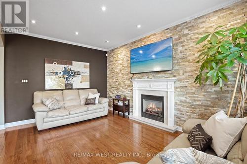 17 Hawkridge Trail, Brampton, ON - Indoor Photo Showing Living Room With Fireplace