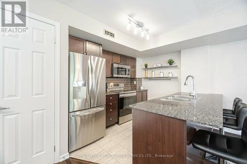 214 - 20 Foundry Avenue, Toronto (Dovercourt-Wallace Emerson-Junction), ON - Indoor Photo Showing Kitchen With Stainless Steel Kitchen With Double Sink