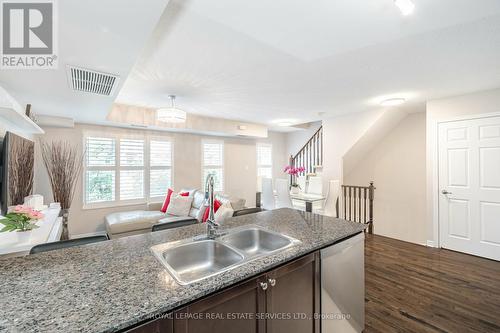 214 - 20 Foundry Avenue, Toronto (Dovercourt-Wallace Emerson-Junction), ON - Indoor Photo Showing Kitchen With Double Sink