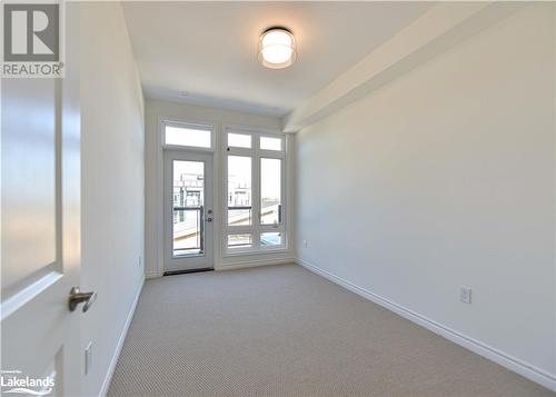 Bedroom 2 with balcony - 25 Wyn Wood Lane, Orillia, ON - Indoor Photo Showing Other Room