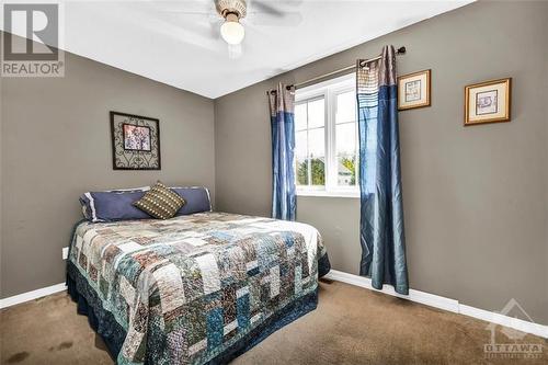 10551 Maurice Street, Mountain, ON - Indoor Photo Showing Bedroom