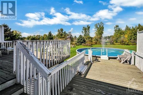 10551 Maurice Street, Mountain, ON - Outdoor With Above Ground Pool