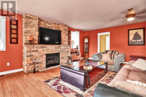 10551 Maurice Street, North Dundas, ON - Indoor Photo Showing Living Room With Fireplace