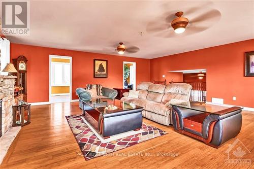 10551 Maurice Street, North Dundas, ON - Indoor Photo Showing Living Room With Fireplace