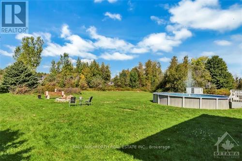 10551 Maurice Street, North Dundas, ON - Outdoor With Above Ground Pool With View