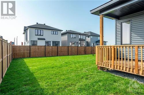 Fenced yard with a gate installed - 995 Acoustic Way, Ottawa, ON - Outdoor