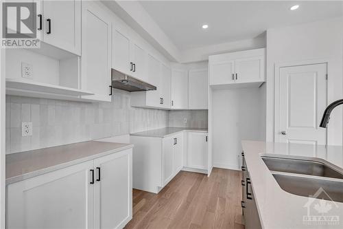 Gas line for upgraded gas stove - 995 Acoustic Way, Ottawa, ON - Indoor Photo Showing Kitchen With Double Sink