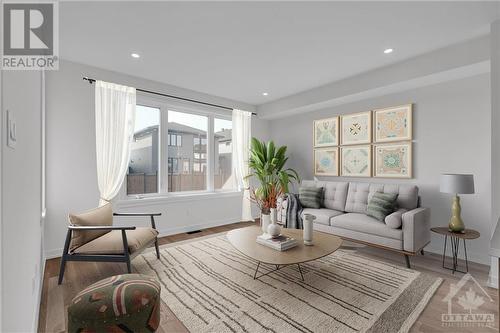 Main floor living area, virtually staged - 995 Acoustic Way, Ottawa, ON - Indoor Photo Showing Living Room