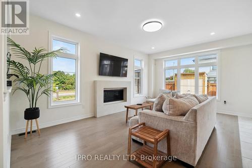 42 Prunella Crescent, East Gwillimbury, ON - Indoor Photo Showing Living Room With Fireplace