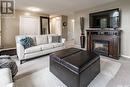 110 Hogg Crescent, Saskatoon, SK  - Indoor Photo Showing Living Room With Fireplace 