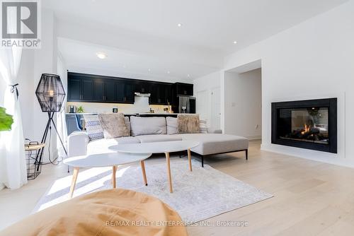 61 Wheatfield Road, Barrie, ON - Indoor Photo Showing Living Room With Fireplace