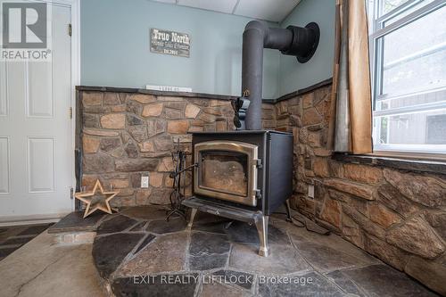 677 Golf Course Road, Douro-Dummer, ON - Indoor With Fireplace