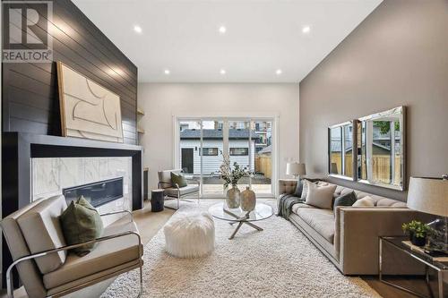 11' ceilings on Main - 528 19 Avenue Sw, Calgary, AB - Indoor Photo Showing Living Room With Fireplace