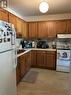 102 - 920 Ford Street, Peterborough (Monaghan), ON  - Indoor Photo Showing Kitchen With Double Sink 