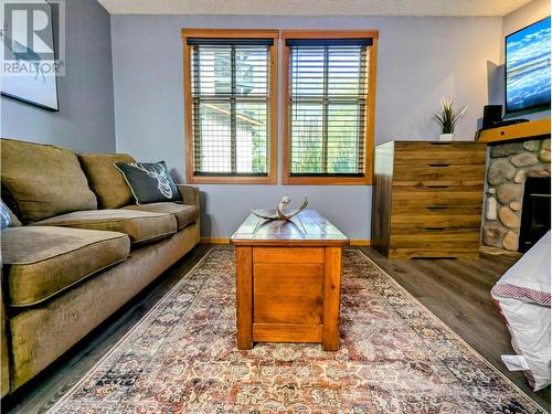 2060 Summit Drive Unit# 104, Panorama, BC - Indoor Photo Showing Living Room With Fireplace