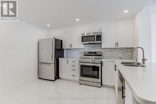 1201 - 1101 Steeles Avenue W, Toronto (Westminster-Branson), ON - Indoor Photo Showing Kitchen With Stainless Steel Kitchen With Double Sink