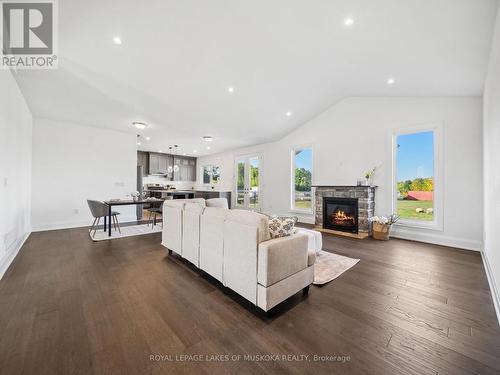 24 Keyzer Drive, Oro-Medonte, ON - Indoor Photo Showing Living Room With Fireplace