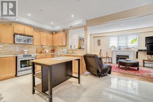 78 Laurier Avenue W, Richmond Hill, ON - Indoor Photo Showing Kitchen With Fireplace