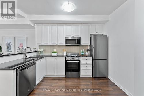 104 - 17 Coneflower Crescent, Toronto (Westminster-Branson), ON - Indoor Photo Showing Kitchen With Stainless Steel Kitchen