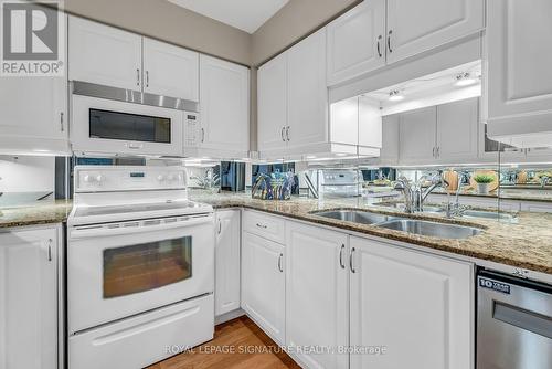 702 - 12 Rean Drive, Toronto (Bayview Village), ON - Indoor Photo Showing Kitchen With Double Sink