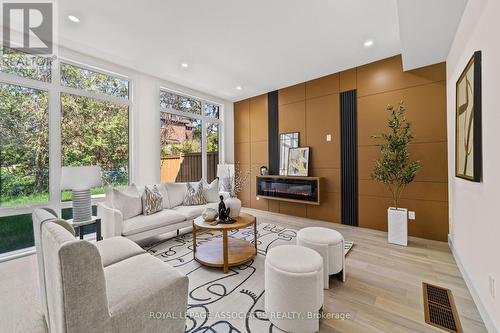 98 Bobmar Road, Toronto, ON - Indoor Photo Showing Living Room With Fireplace