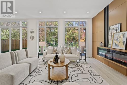 98 Bobmar Road, Toronto, ON - Indoor Photo Showing Living Room With Fireplace