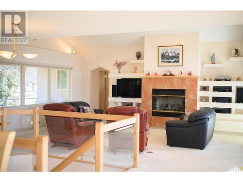 307 Sandpiper Court, Kelowna, BC - Indoor Photo Showing Living Room With Fireplace