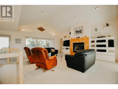 307 Sandpiper Court, Kelowna, BC - Indoor Photo Showing Living Room With Fireplace