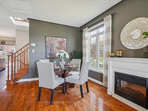 4 Cardiff Lane, Hamilton, ON - Indoor Photo Showing Dining Room With Fireplace