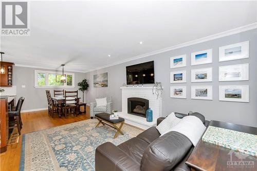 2149 Queensgrove Road, Ottawa, ON - Indoor Photo Showing Living Room With Fireplace