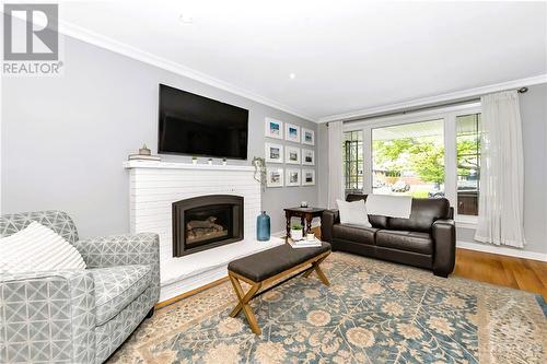 2149 Queensgrove Road, Ottawa, ON - Indoor Photo Showing Living Room With Fireplace