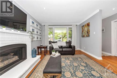 2149 Queensgrove Road, Ottawa, ON - Indoor Photo Showing Living Room With Fireplace