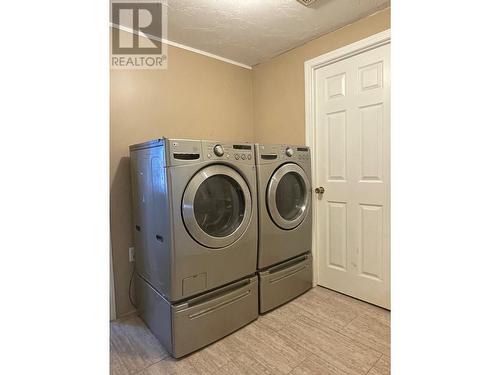 8 2963 Klahannie Drive, Fort Nelson, BC - Indoor Photo Showing Laundry Room