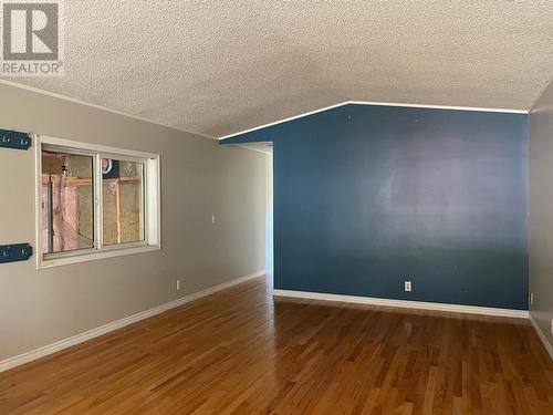 8 2963 Klahannie Drive, Fort Nelson, BC - Indoor Photo Showing Other Room