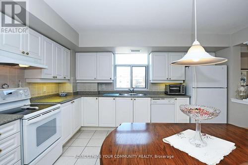 419 - 2502 Rutherford Road, Vaughan, ON - Indoor Photo Showing Kitchen With Double Sink