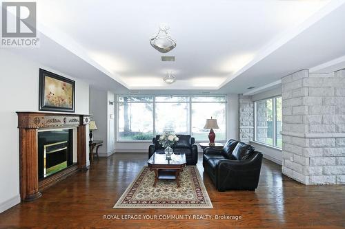 419 - 2502 Rutherford Road, Vaughan, ON - Indoor Photo Showing Living Room With Fireplace