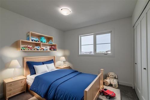 35 Chimney Swift Way, St Adolphe, MB - Indoor Photo Showing Bedroom