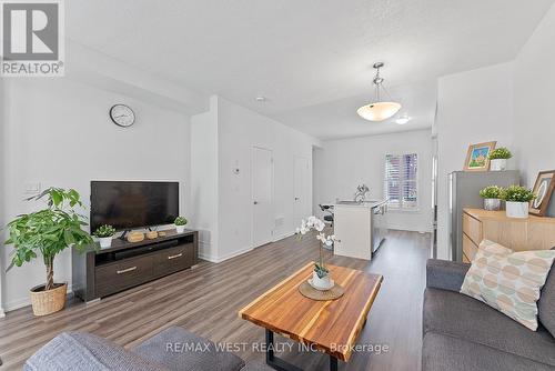 80 - 10 William Jackson Way, Toronto (Mimico), ON - Indoor Photo Showing Living Room