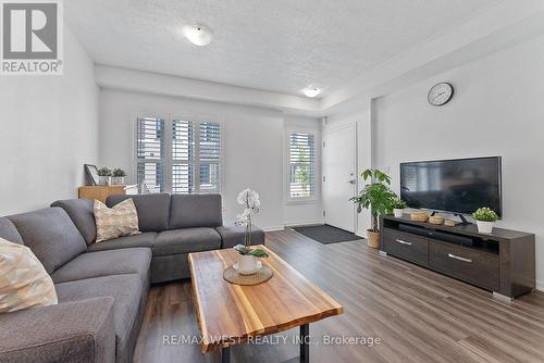 80 - 10 William Jackson Way, Toronto (Mimico), ON - Indoor Photo Showing Living Room