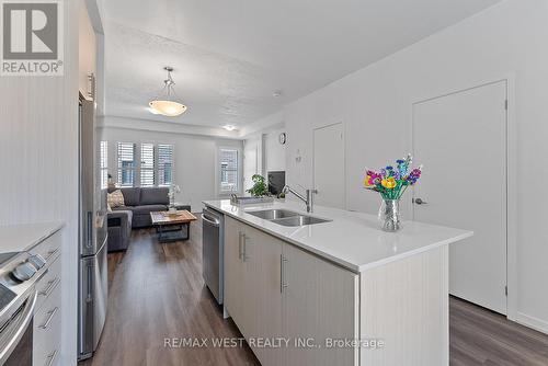 80 - 10 William Jackson Way, Toronto (Mimico), ON - Indoor Photo Showing Kitchen With Double Sink