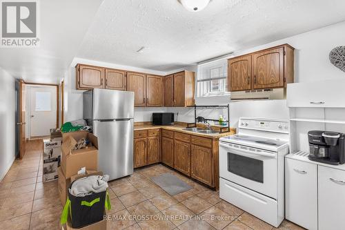 107 Fred Cook Drive, Bradford West Gwillimbury (Bradford), ON - Indoor Photo Showing Kitchen With Double Sink